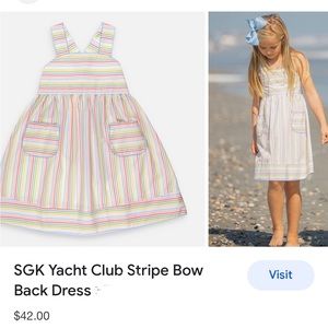 New w/o tag SGK Sz 5 multi-color striped dress. Smoke free pet friendly.
